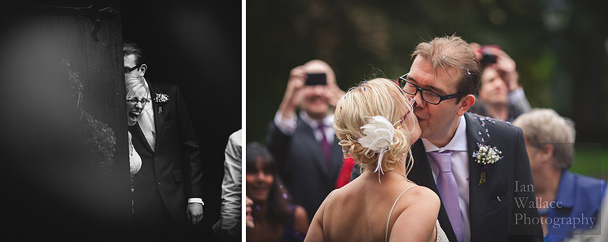 Reportage photography of husband and wife emerging from wedding ceremony