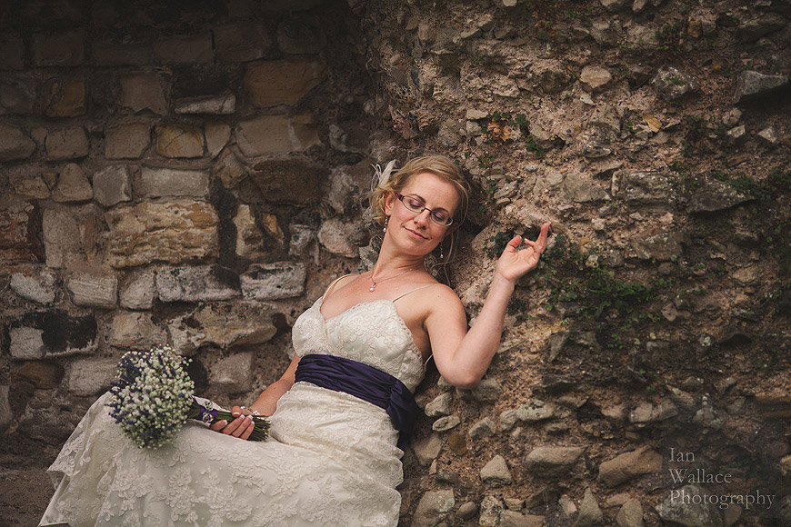 Beautiful portrait of bride posing in York Museum gardens