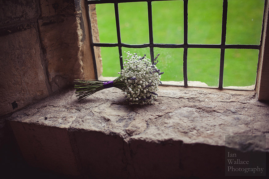 Bouquet left on a stone window sill at York Hospitium