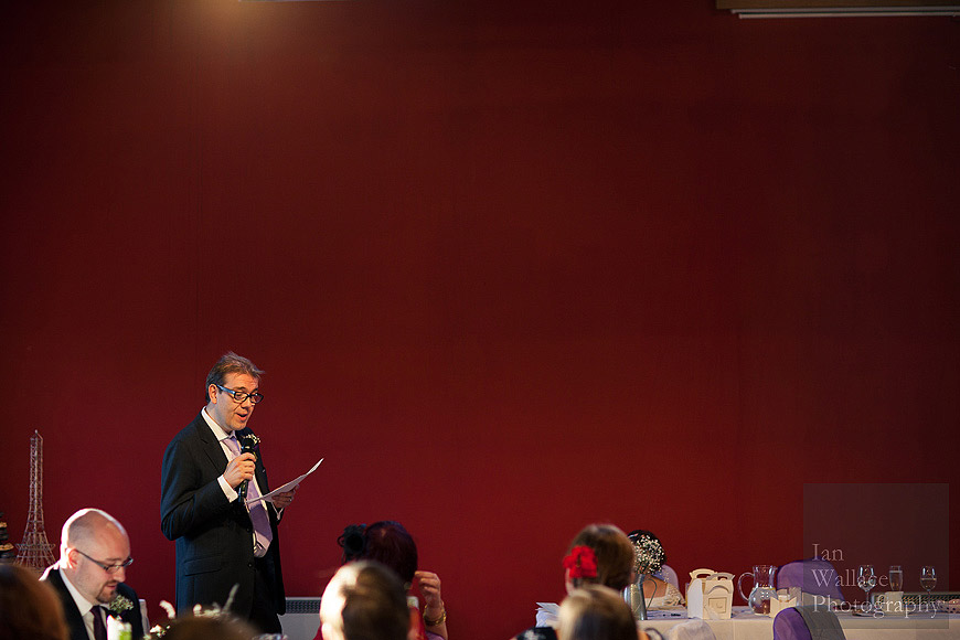 Creative photo of groom performing his speech at York Hospitium