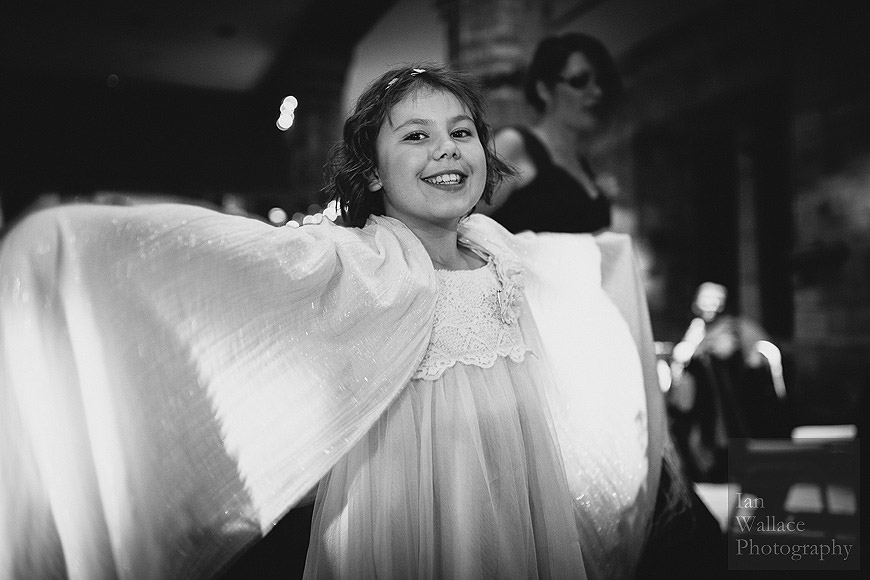 The Hospitium's very own wedding angel - a child uses her wings