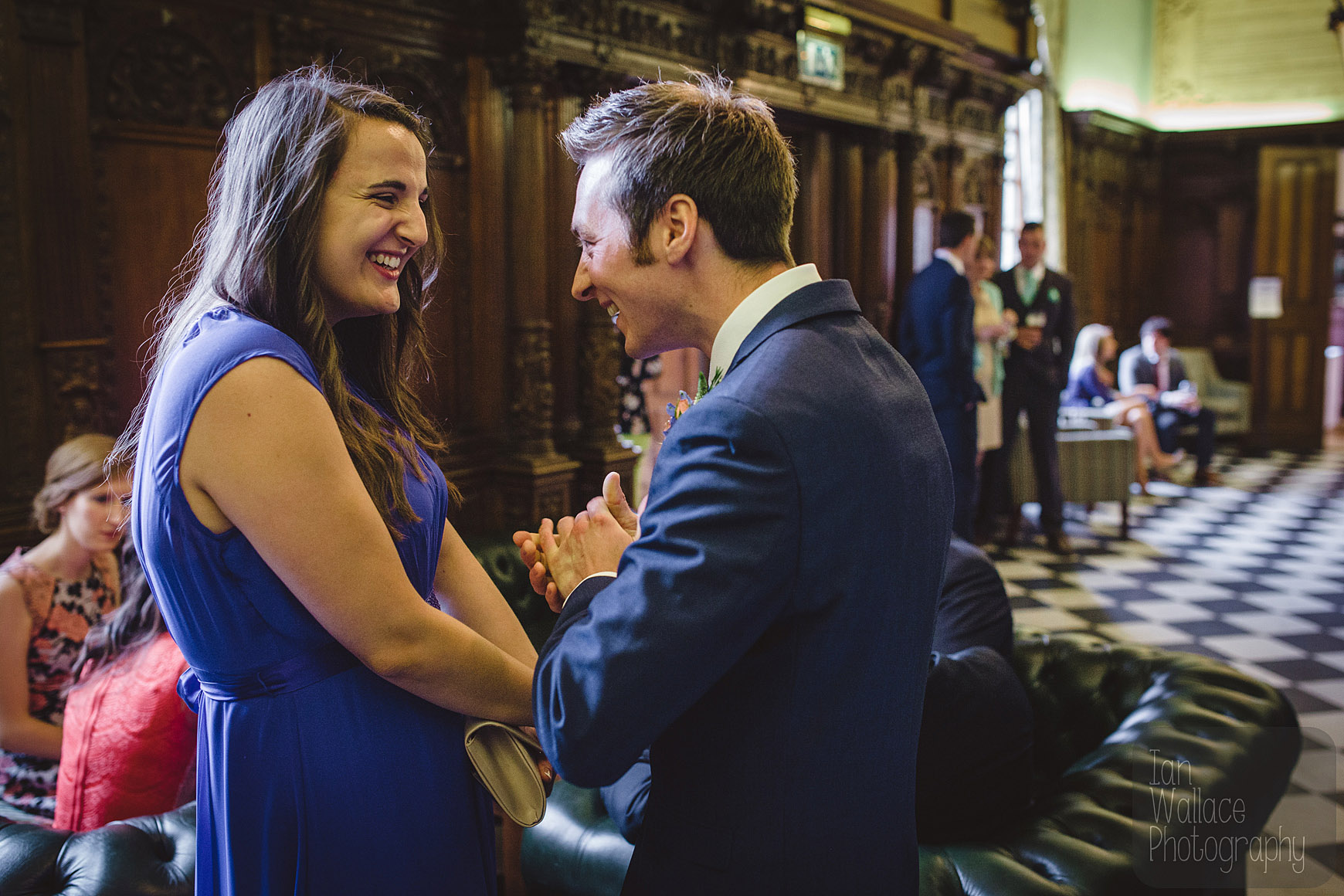 Reportage photography of guests during the build up to the ceremony