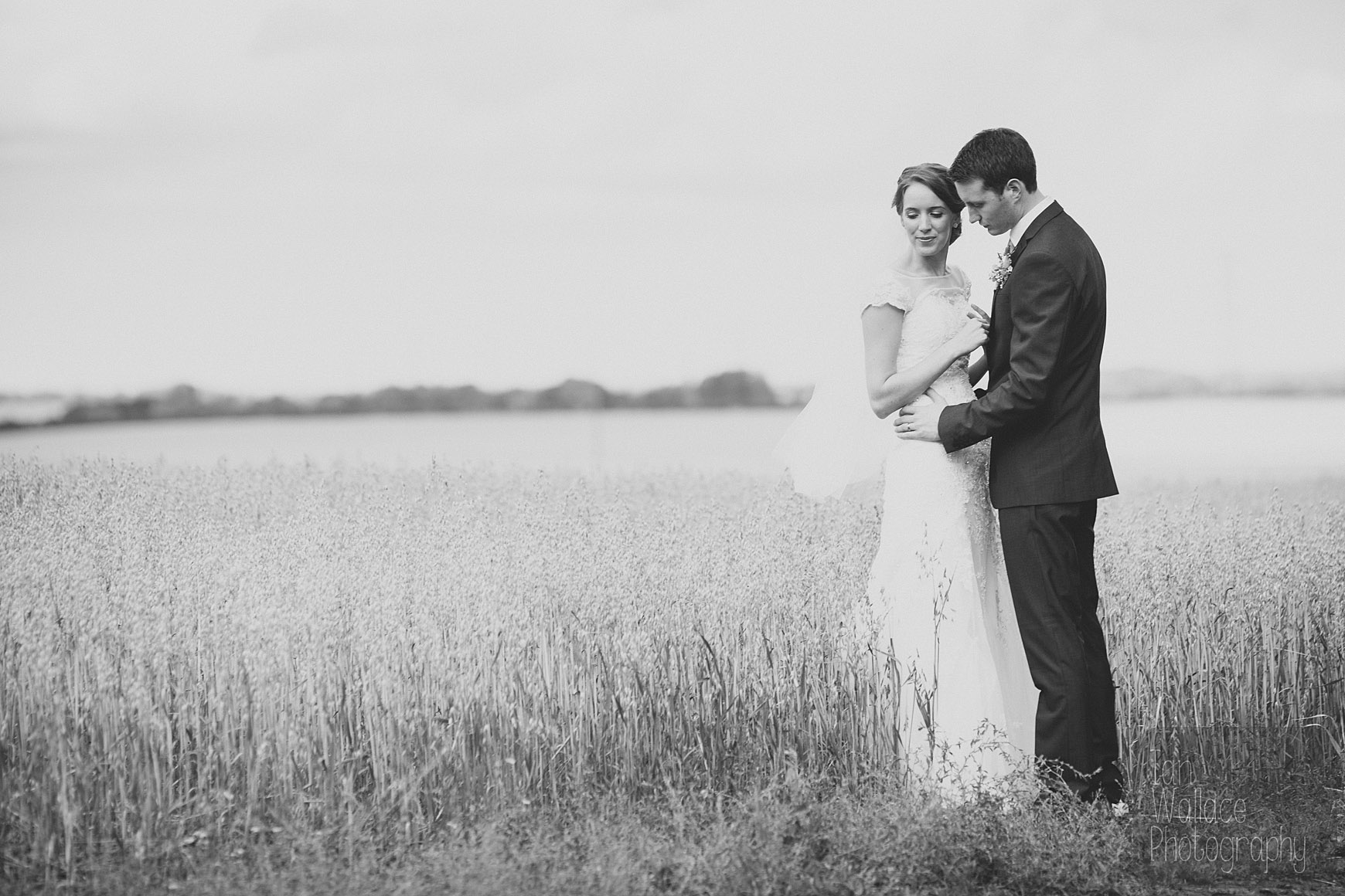 Fine art wedding photography - bride and groom in a corn field