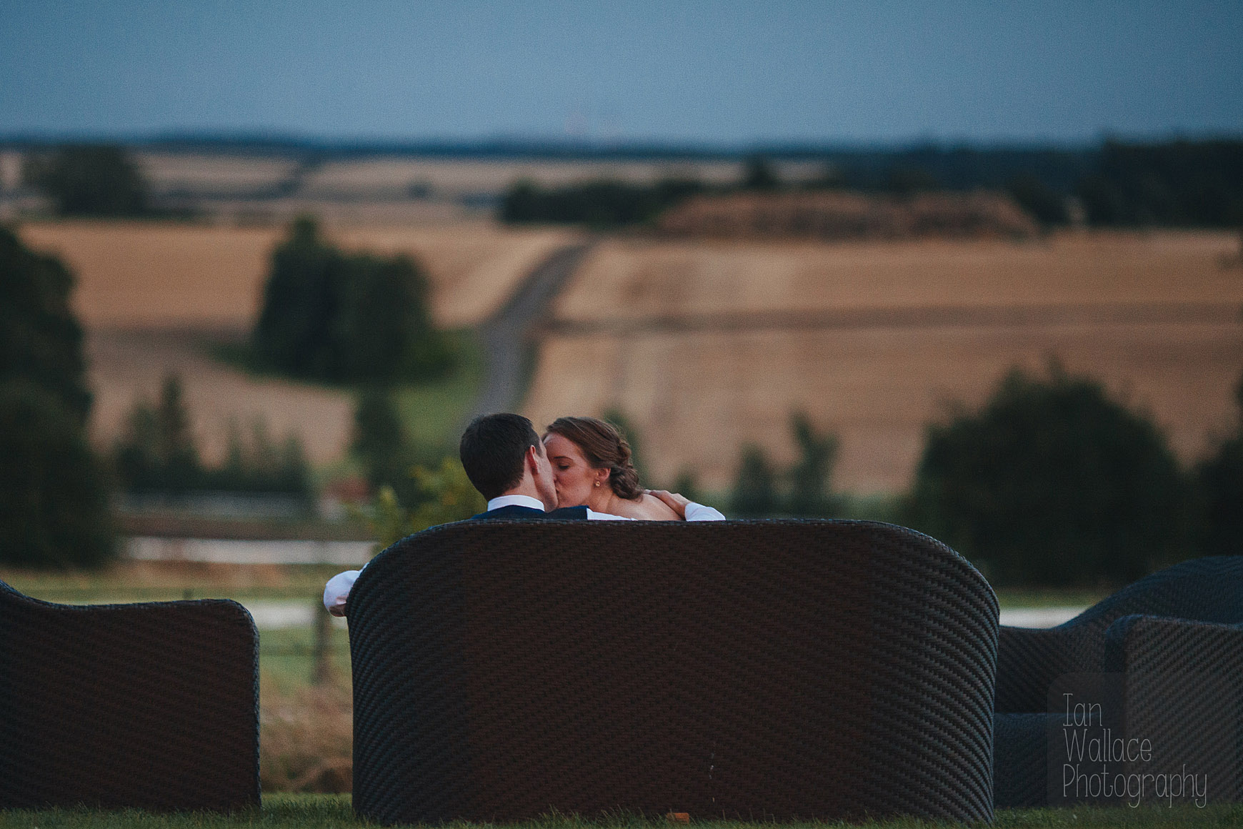 Bride and groom sharing a quiet moment over looking the views across Yorkshrire from Hazlewood Castle