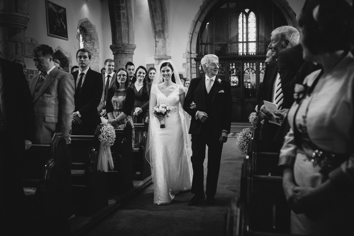 The bride and her father walking down the aisle