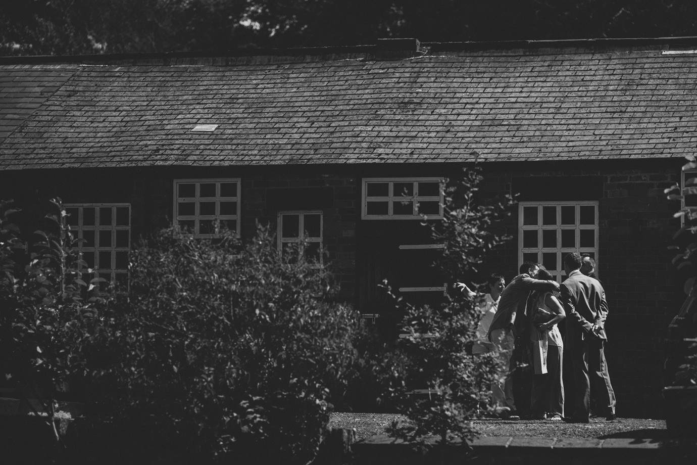 Greeting guests, Cheshire documentary wedding photograph